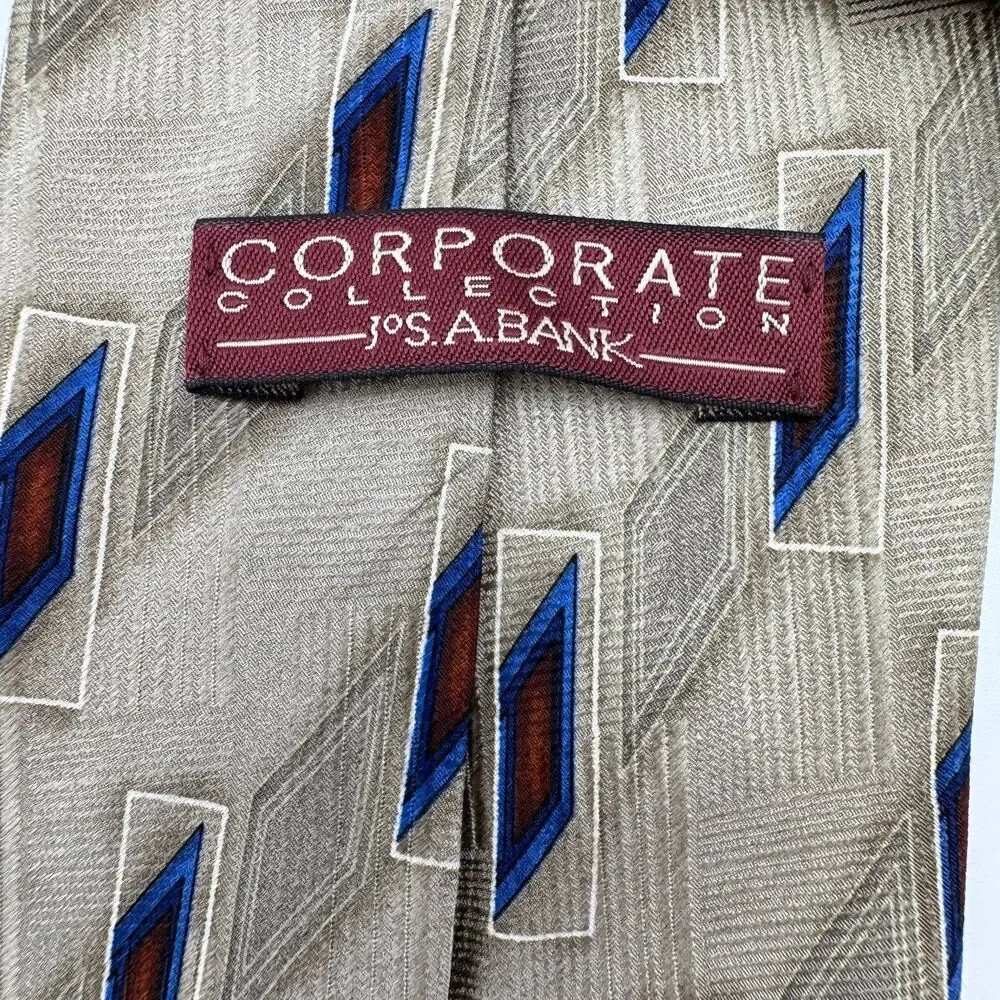 JOS A  BANK Men's Tie Corporate Coll Beige Blue Burgundy Geometric Pattern Silk
